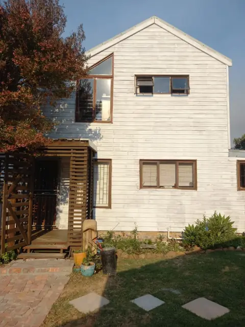 Timber house exterior in undercoat, ready for topcoat