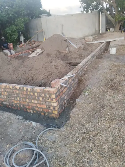Brickwork foundation walls on a new building site