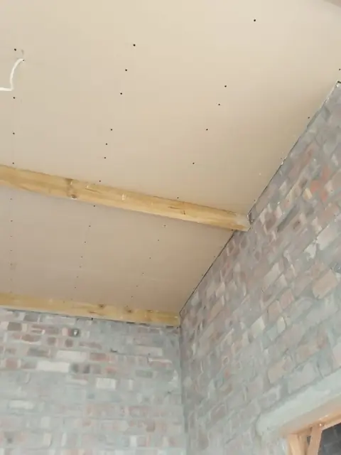 New interior brick walls with ceiling boards fitted above