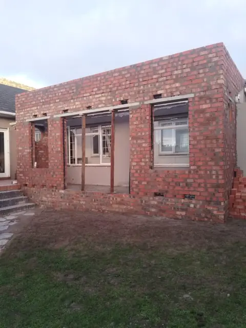 Face-brick extension shell, wider angle of the rear addition