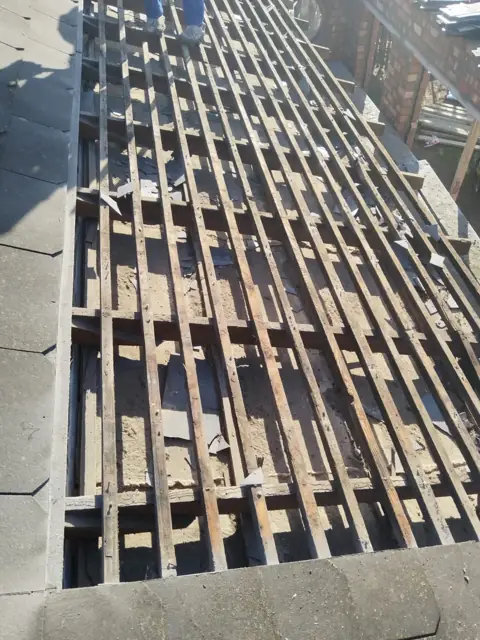Timber roof batten grid viewed from above