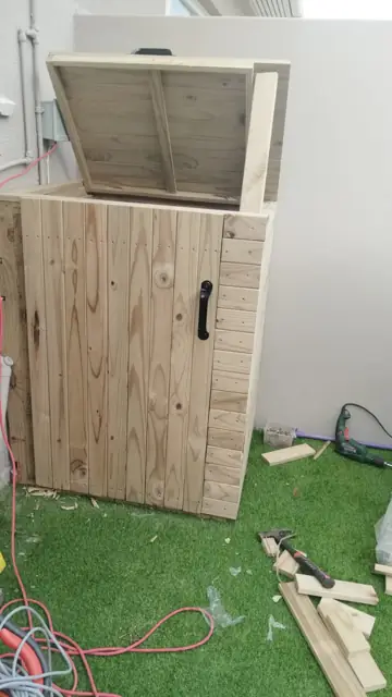 Custom timber storage box with hinged lid, built on site