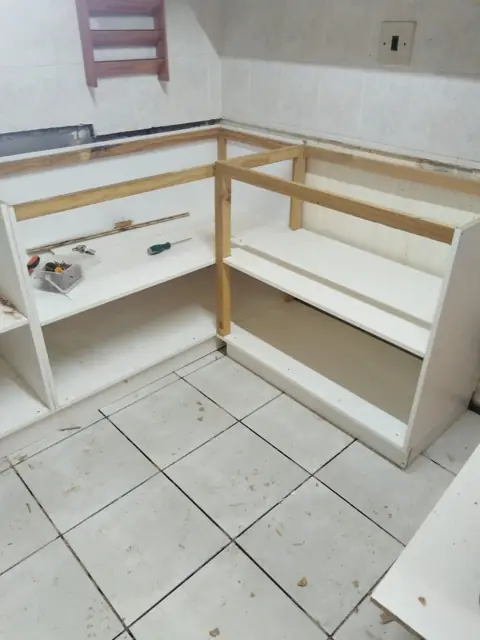 Kitchen corner base cabinet frame under construction