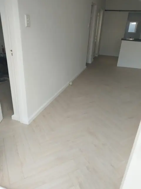 Completed herringbone floor in open living area