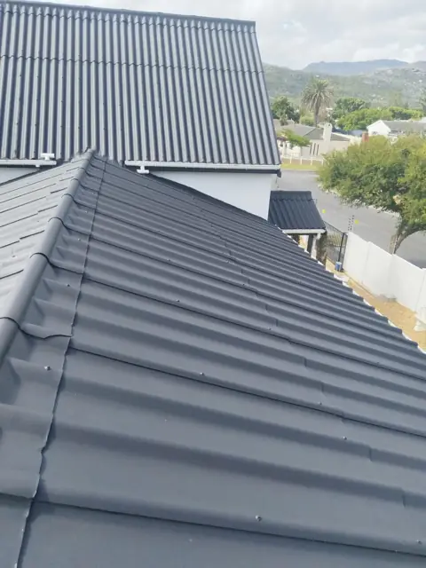 Repainted corrugated roof overview