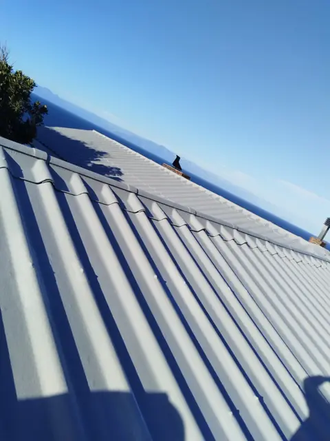 Newly coated roof overlooking the coast
