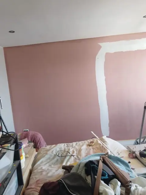Interior wall primed and patched for repaint
