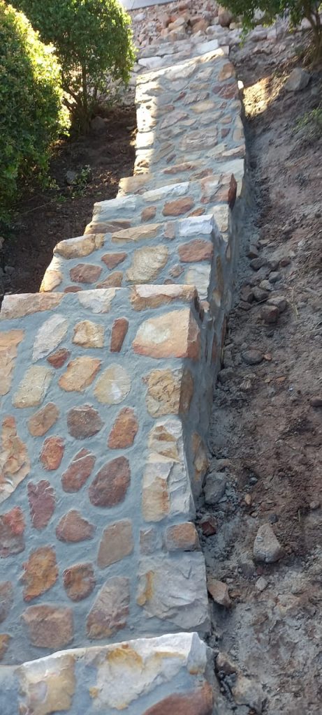 Stone-clad garden steps and retaining wall — stone cladding