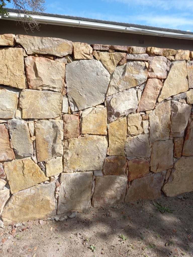 Sandstone cladding on a house exterior wall — stone cladding for exterior walls