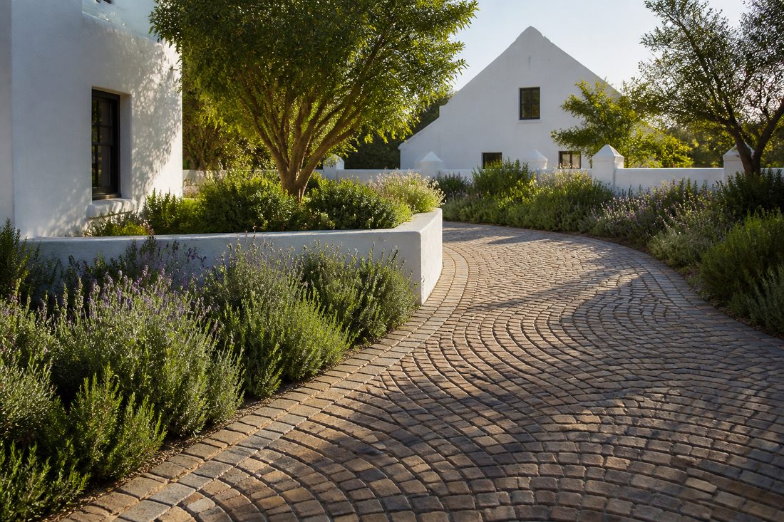 Curved cobblestone courtyard paving example