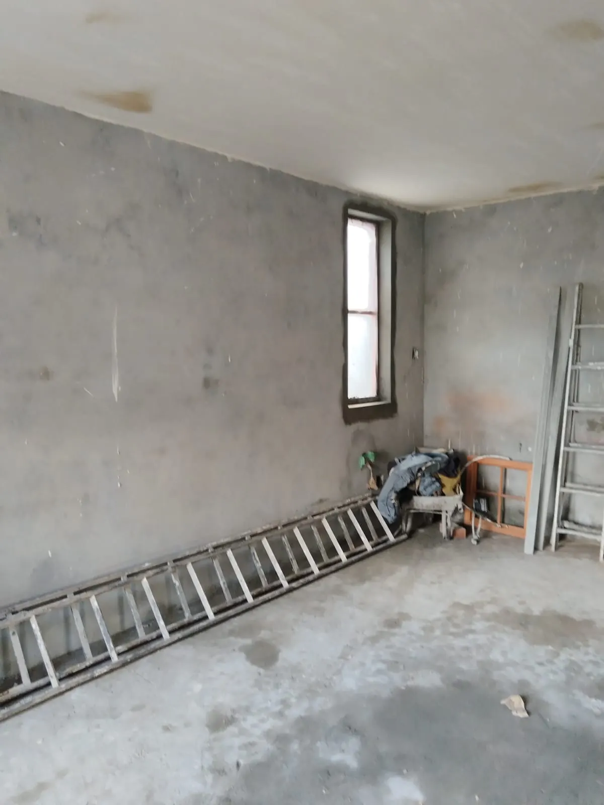 Cracked wall inspection and plaster preparation