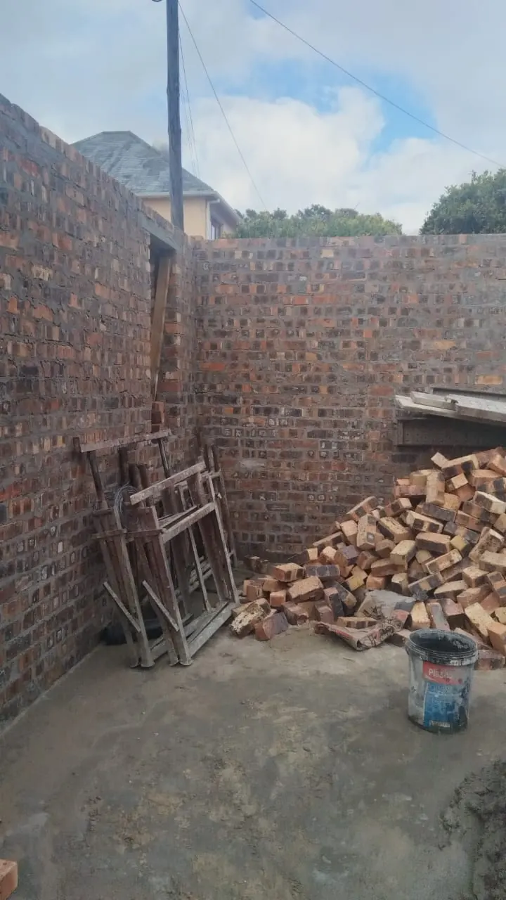 Face-brick wall corner during repointing work