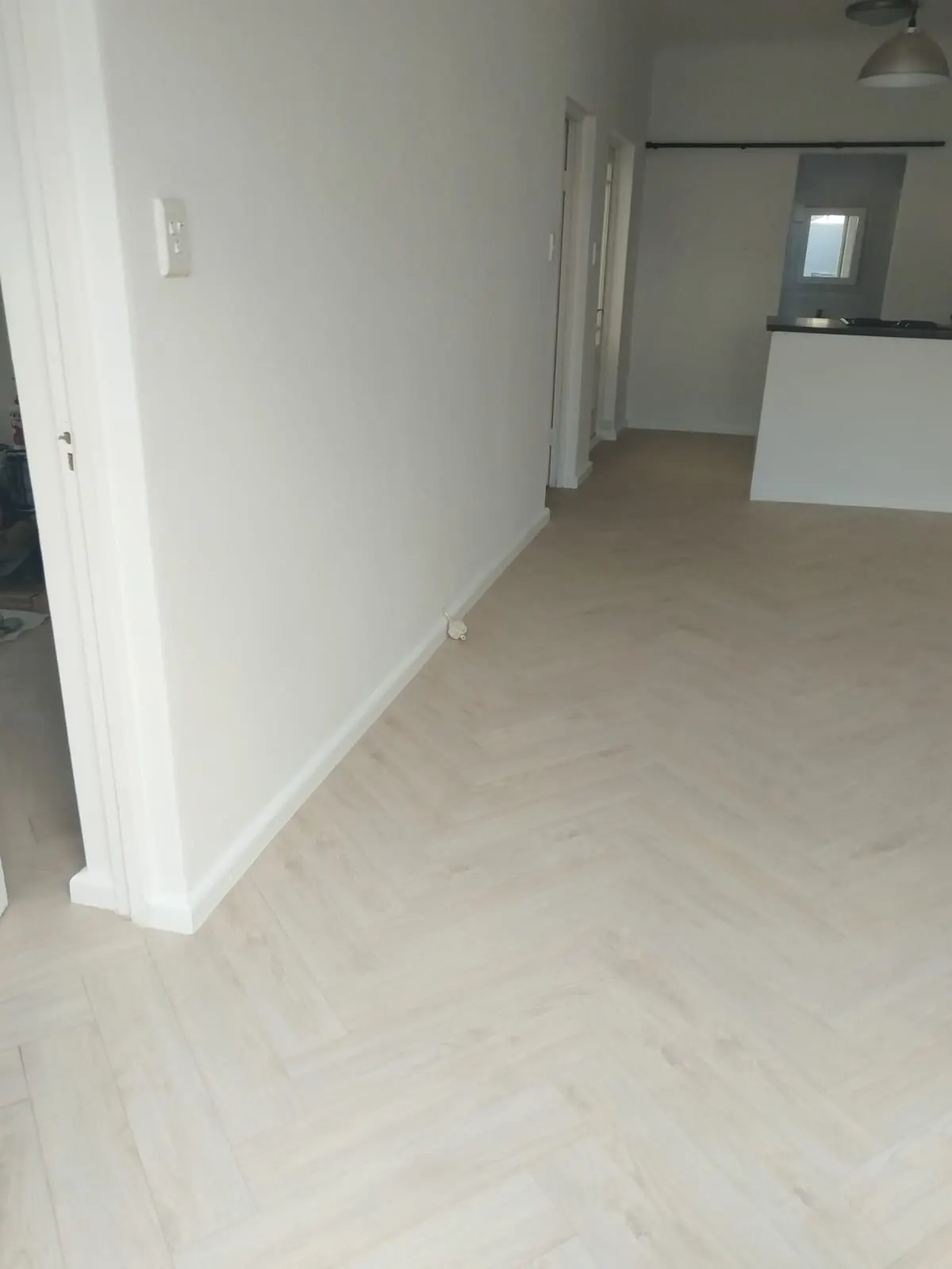Completed herringbone floor in finished room