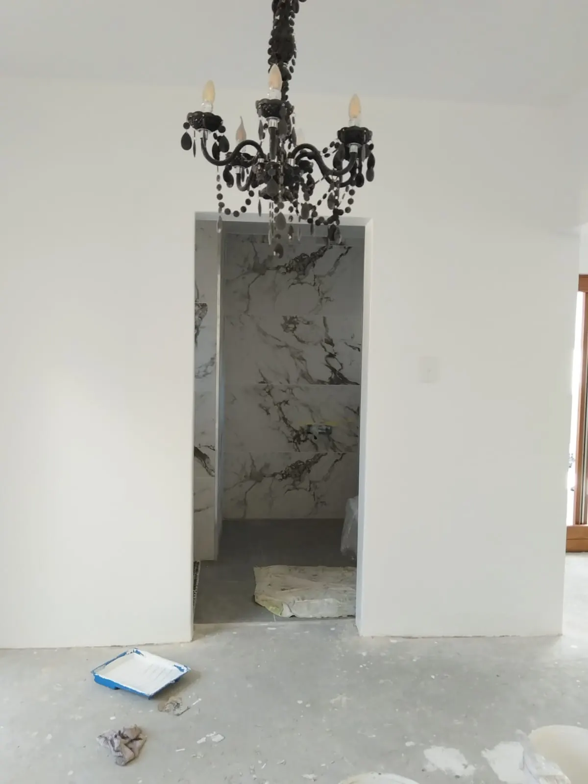 Skimmed archway interior with chandelier