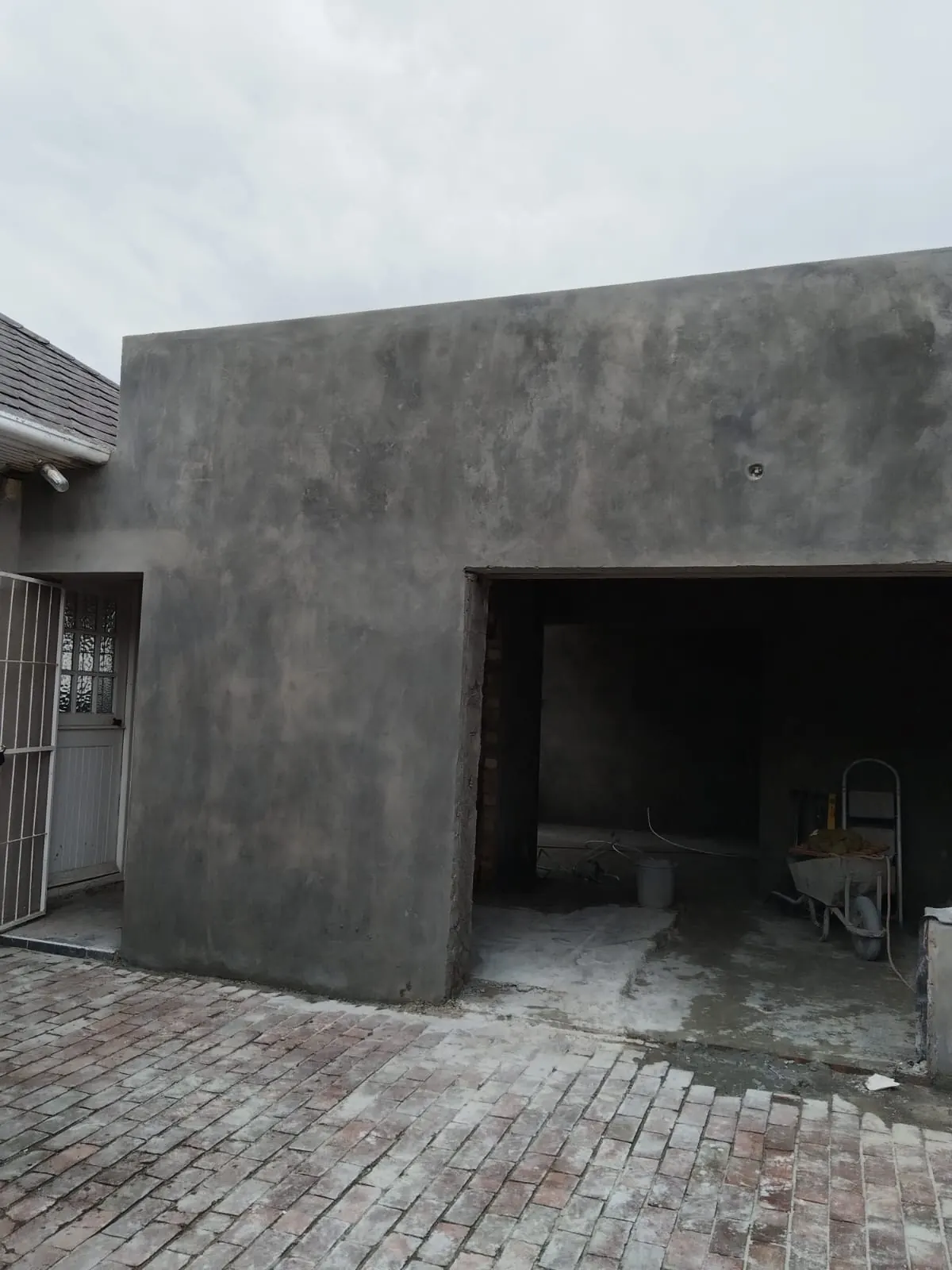 Freshly plastered garage outbuilding